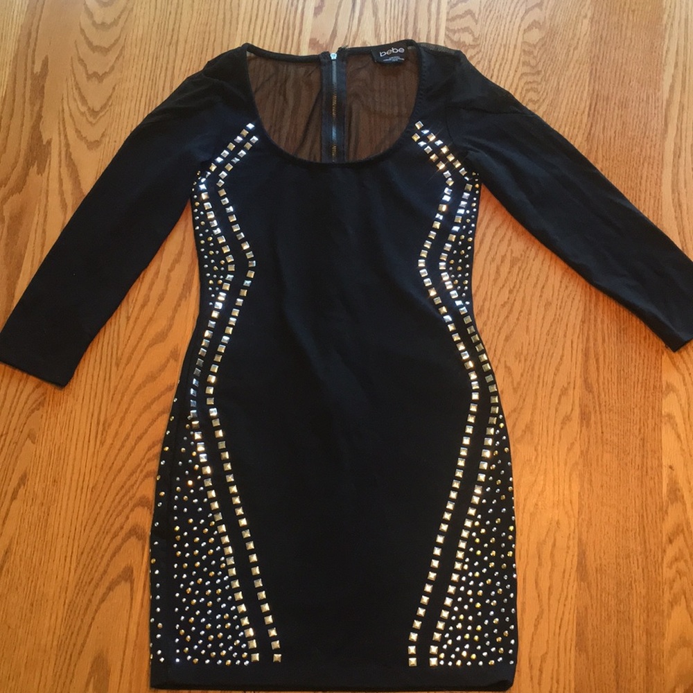 Black jeweled bodycon mini dress.